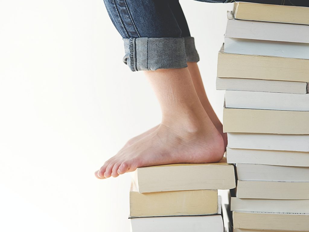 Crushing the Reading Game: Unveiling the Secrets to 100 Books a&nbsp;Year